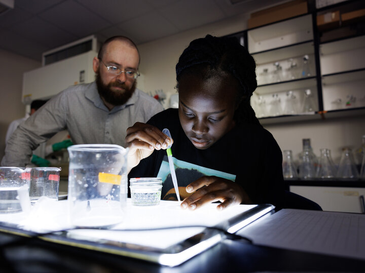 Student with Professor Assistance Stem Power